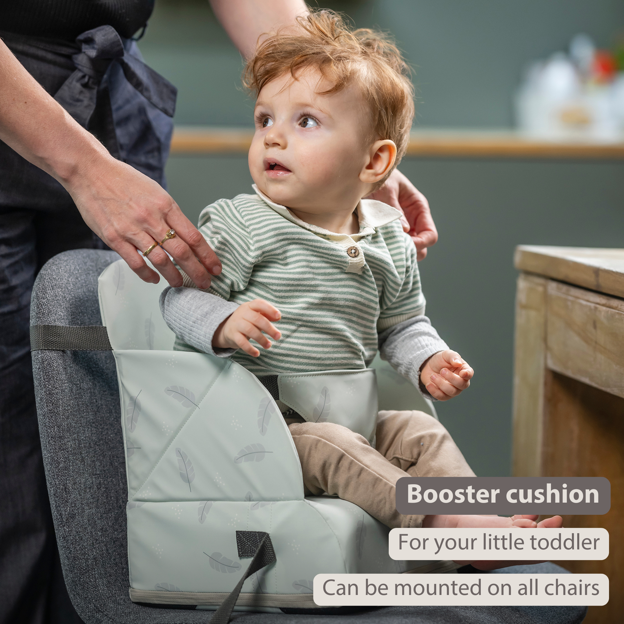 Foody Foldable Booster Seat for Dining Chair - Water-Resistant Seat with Safety Belt - Light Green with Feathers [EN]